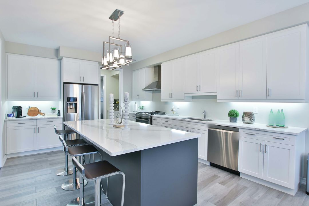 Sample kitchen: white Shaker cabinets and a gray island